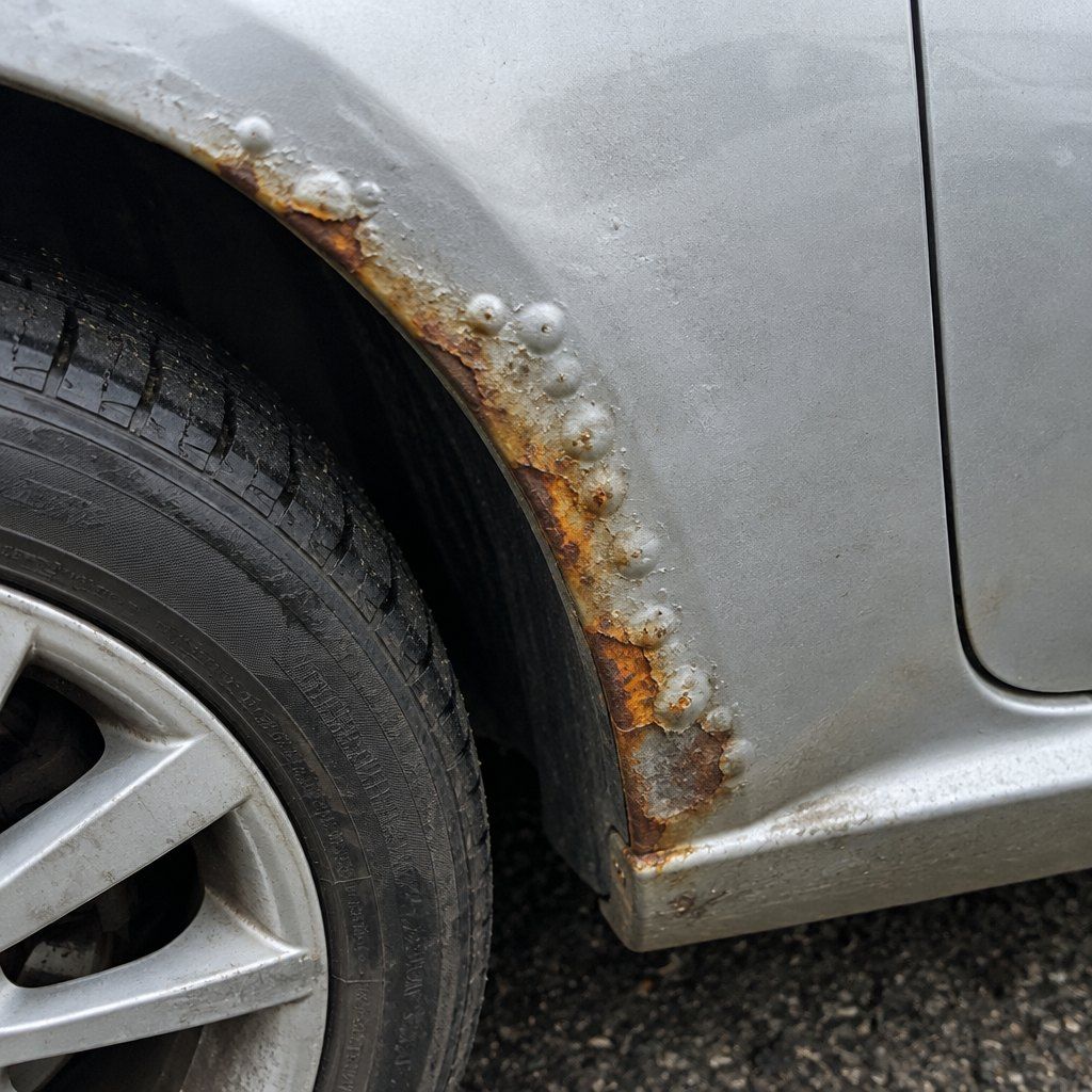 Illustration: rust on a wheel arch